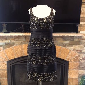 Black and gold cocktail dress super cute